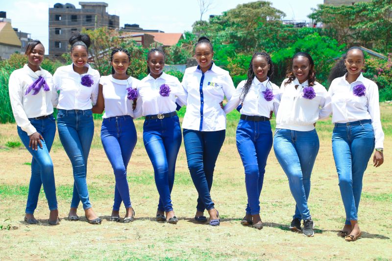 Team in casual white and purple uniforms